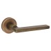 Carlisle Brass Antique Brass Door Handles on Round Rose - Trentino Range 