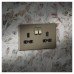 Knightsbridge 13A 2 Gang Screwless Flat Plate Double Pole Switched Socket - Antique Brass/Black