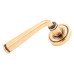 From The Anvil Polished Bronze Door Handles on Round Art Deco Rose - Avon Range 