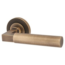 Burlington BUR30 Antique Brass Door Handles on Round Reeded Rose - Westminster Range 