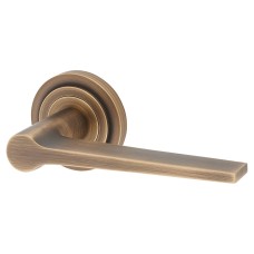 Burlington BUR20 Antique Brass Door Handles on Round Stepped Rose - Knightsbridge Range 