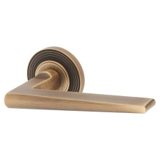 Burlington BUR10 Antique Brass Door Handles on Round Reeded Rose - Mayfair Range 