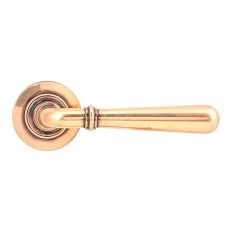 From The Anvil Polished Bronze Door Handles on Round Screw On Rose - Newbury Range 