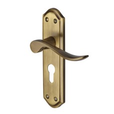 Heritage Brass by M Marcus Antique Brass Scroll Euro Lock Door Handle - Sandown Range - 180 x 48mm