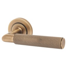 Burlington BUR40 Antique Brass Knurled Door Handles on Round Rose - Piccadilly Range 