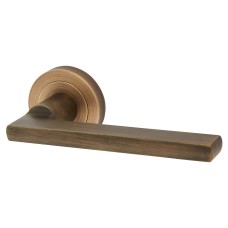Carlisle Brass Antique Brass Door Handles on Round Rose - Trentino Range 