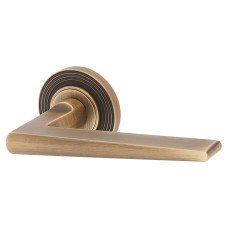 Burlington BUR10 Antique Brass Door Handles on Round Reeded Rose - Mayfair Range 