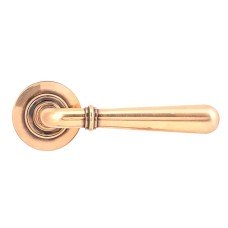 From The Anvil Polished Bronze Door Handles on Round Screw On Rose - Newbury Range 