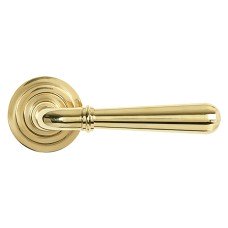 From The Anvil Polished Brass Door Handles on Round Art Deco Rose - Newbury Range 