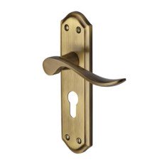 Heritage Brass by M Marcus Antique Brass Scroll Euro Lock Door Handle - Sandown Range - 180 x 48mm