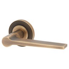 Burlington BUR20 Antique Brass Door Handles on Round Reeded Rose - Knightsbridge Range 
