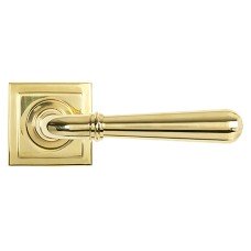 From The Anvil Polished Brass Door Handles on Square Rose - Newbury Range 