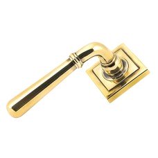 From The Anvil Aged Brass Door Handles on Square Rose - Newbury Range 