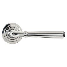 From The Anvil Polished Stainless Steel Door Handles on Round Art Deco Rose - Newbury Range 