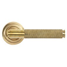 From The Anvil Polished Brass Knurled Door Handles on Round Art Deco Rose - Brompton Range 