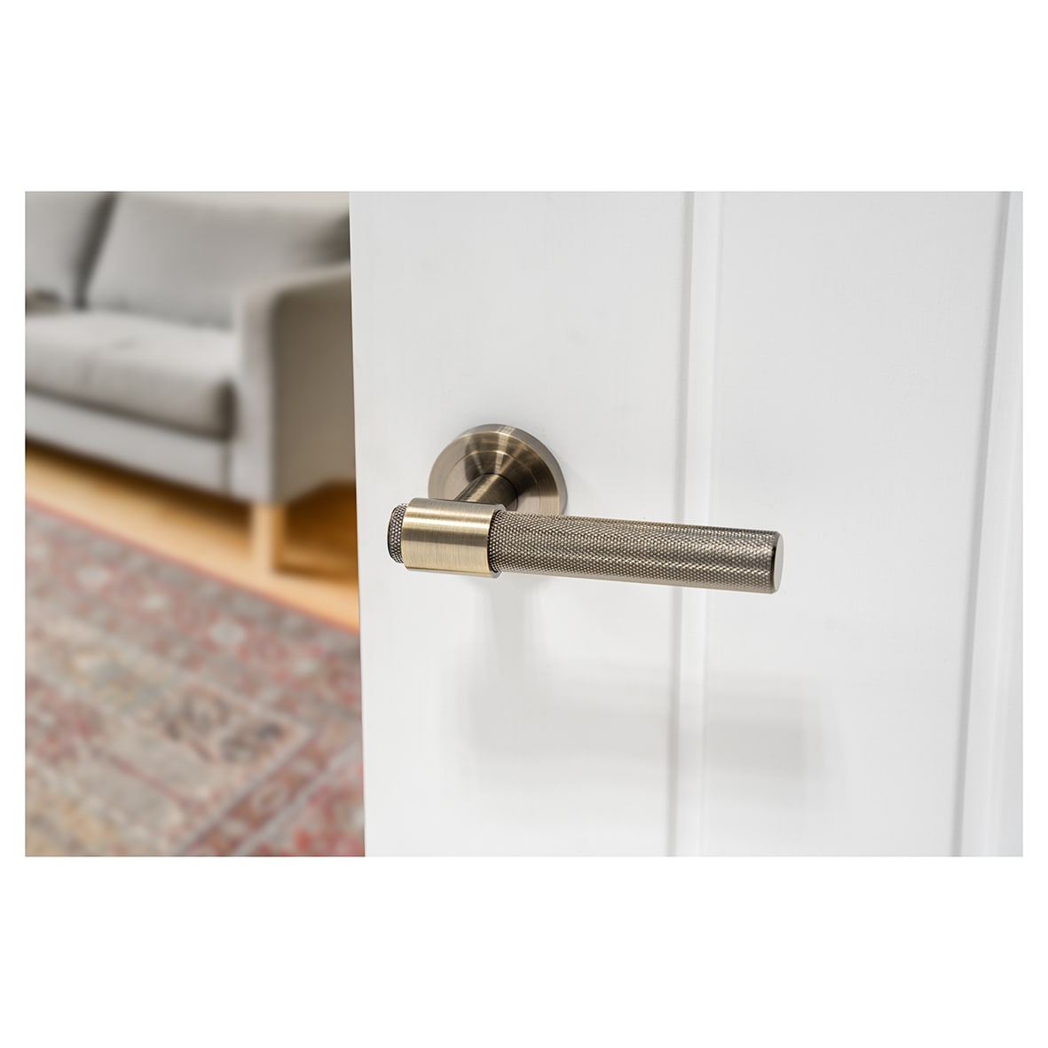 Antique Brass Knurled Door Handles on Round Rose - Esme Range - view 4