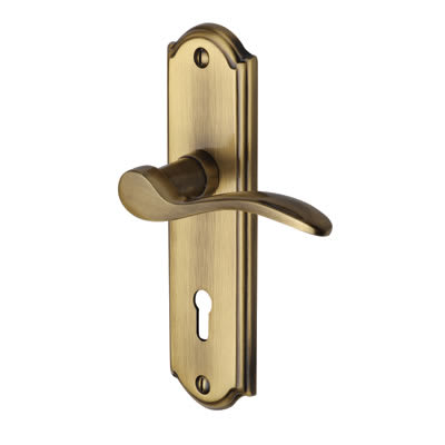 Marcus Antique Brass Scroll Keyhole Lock Door Handles - Howard Range - 171 x 48mm - view 2