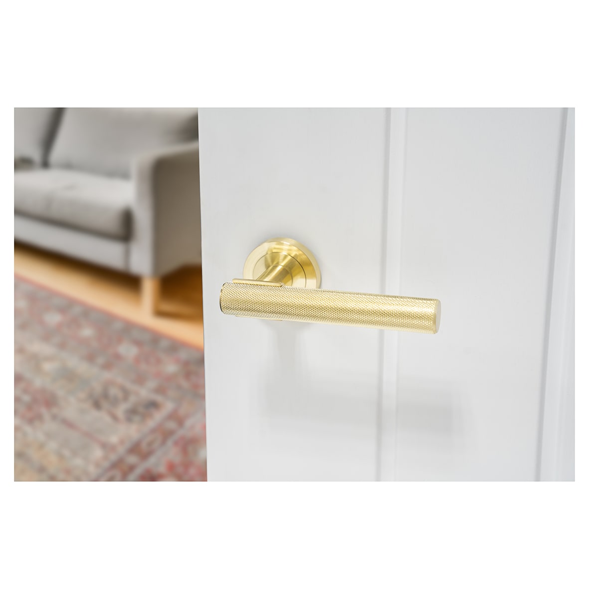 Satin Brass Knurled Door Handles on Round Rose - Orla Range - view 4