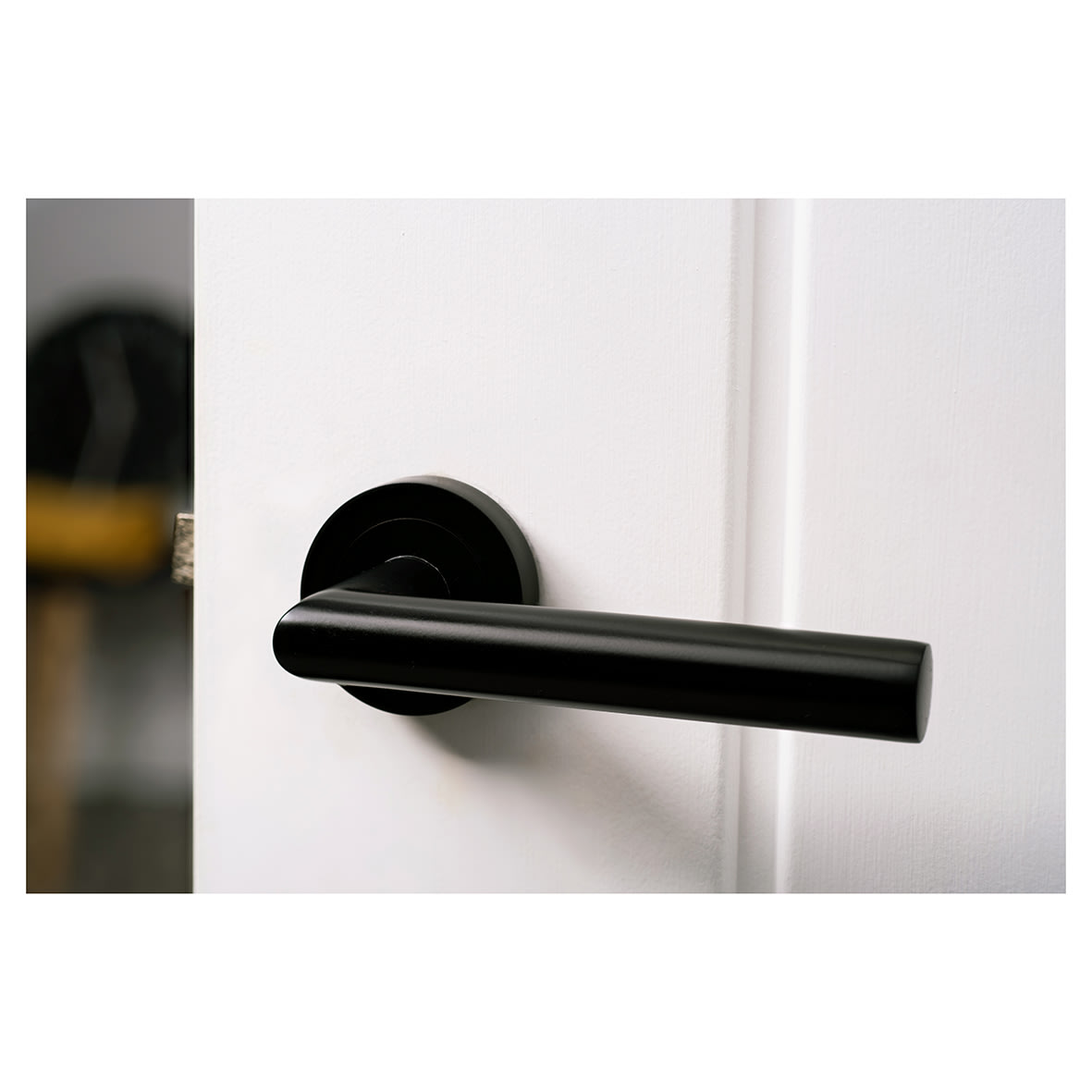 Matt Black Door Handles on Round Rose - Emily Range - view 7
