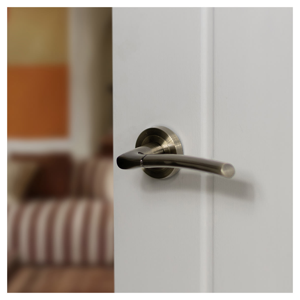 Status Indiana Door Handle on Rose - Antique Brass - view 2