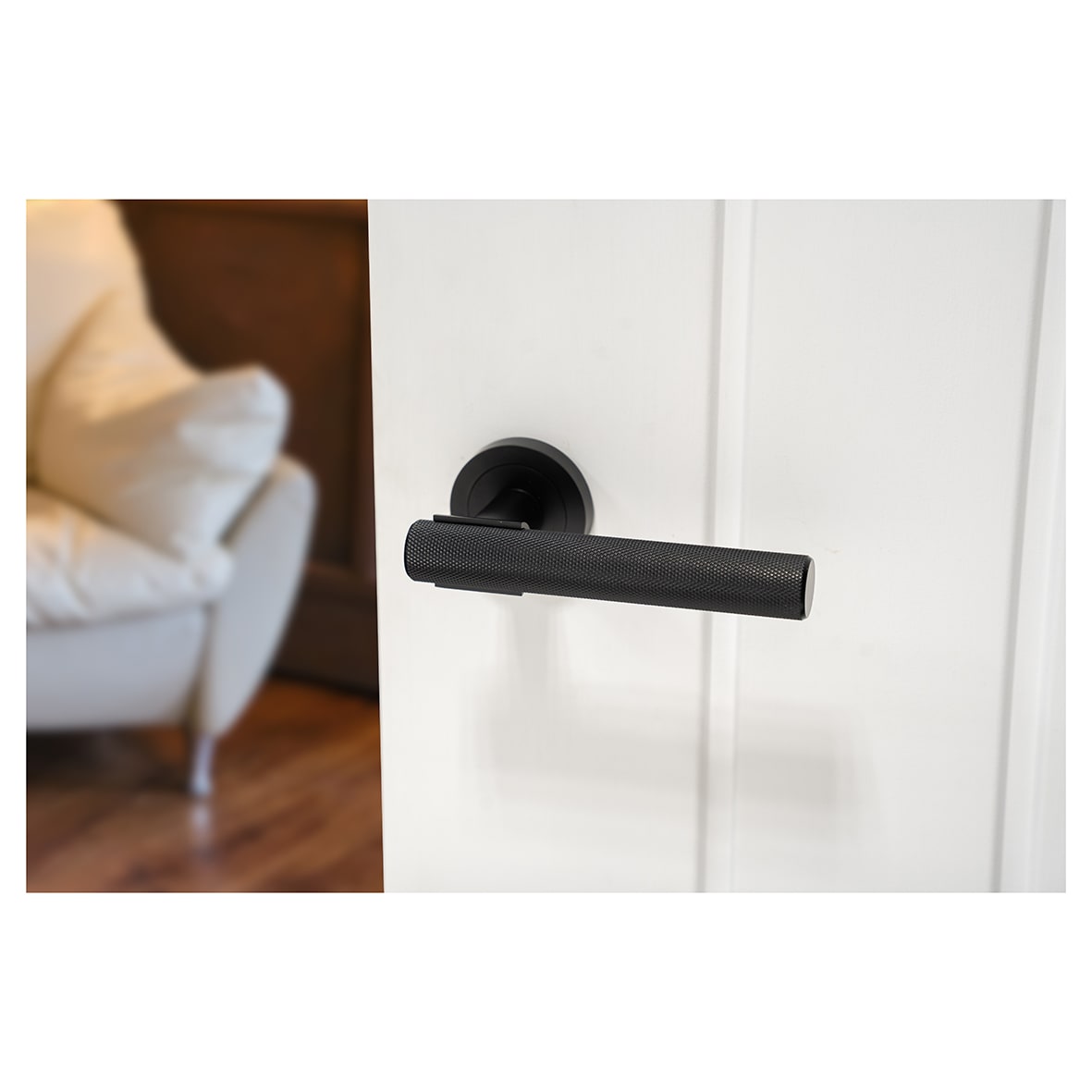 Matt Black Knurled Door Handles on Round Rose - Orla Range - view 4
