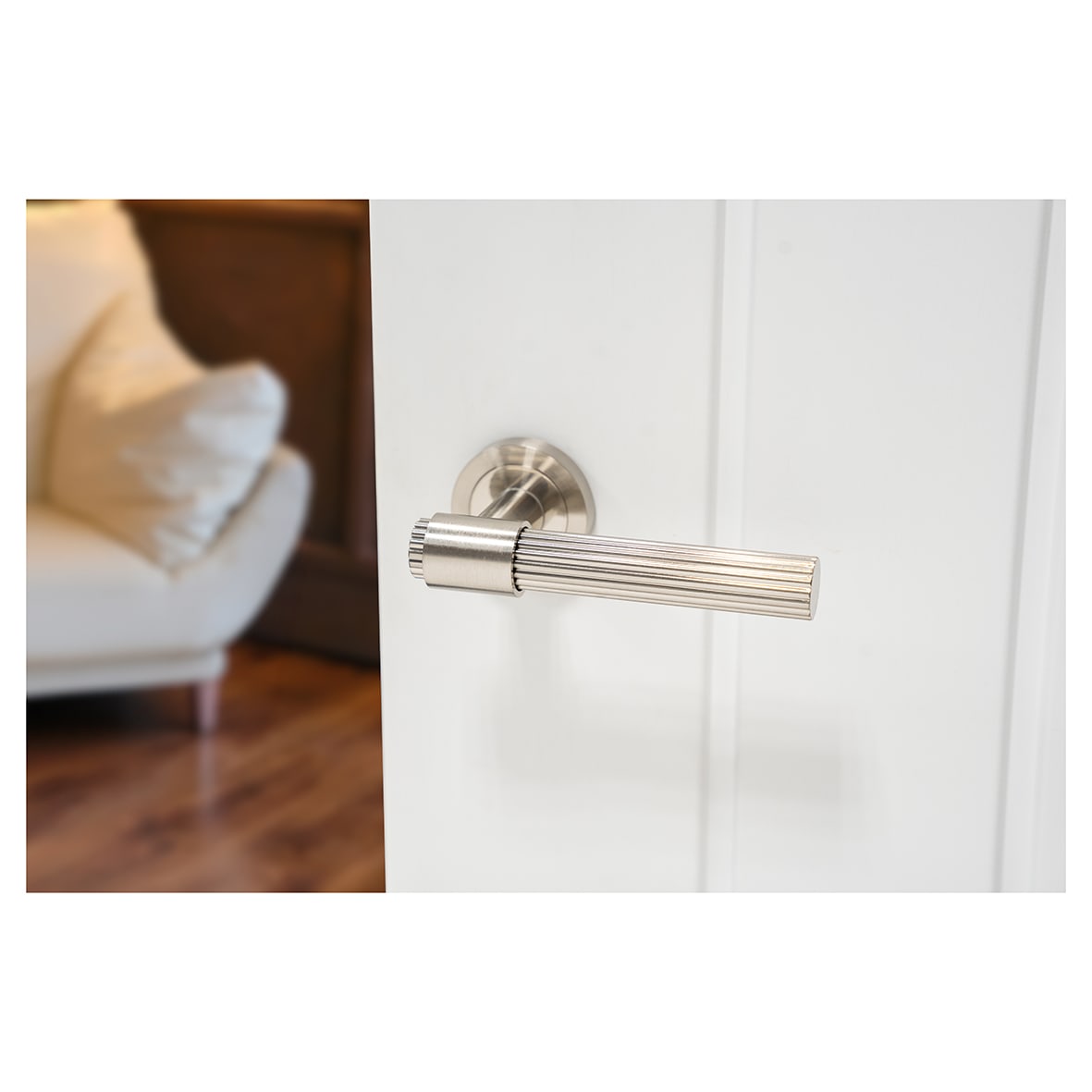 Satin Nickel Lines Door Handles on Round Rose - Eva Range - view 4