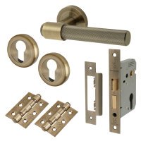 Antique Brass Knurled Euro Lock Door Handles on Rose Pack - Esme Range