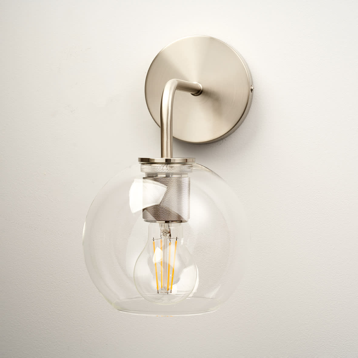 Noord Knurled Indoor Wall Light - Satin Nickel Fittings and Domed Clear Glass Shade
