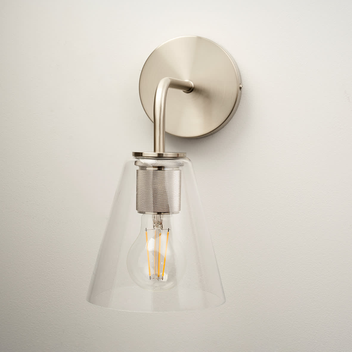 Noord Knurled Indoor Wall Light - Satin Nickel Fittings and Hooded Clear Glass Shade