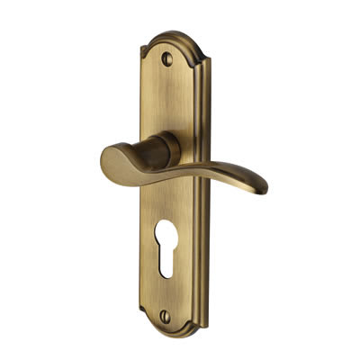 Marcus Antique Brass Scroll Euro Lock Door Handles - Howard Range - 171 x 48mm