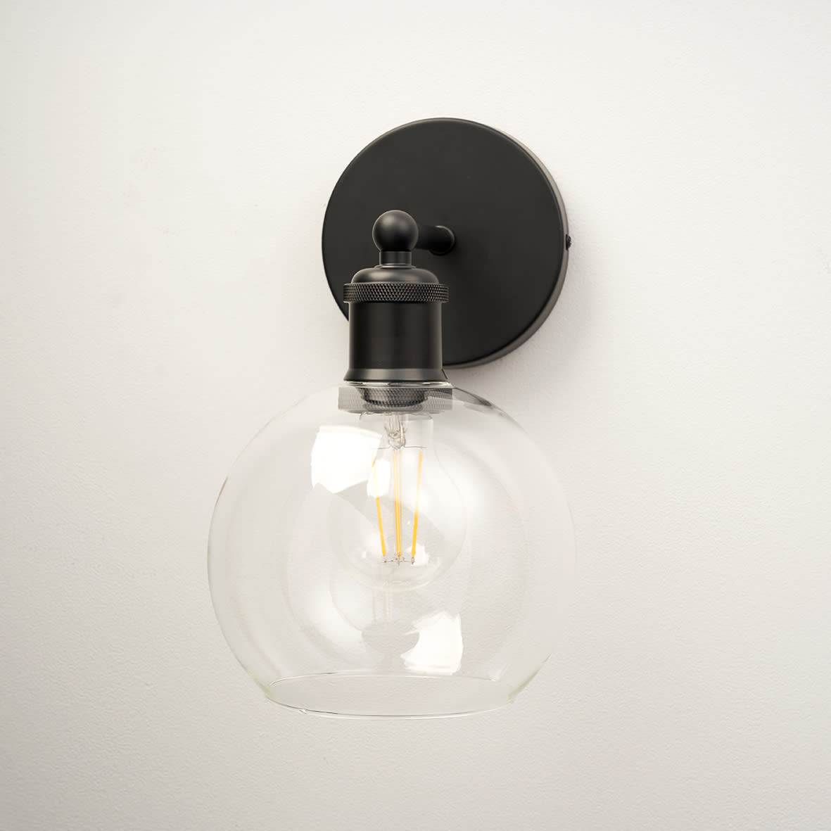 Divi Indoor Wall Light - Matt Black Fittings and Domed Clear Glass Shade